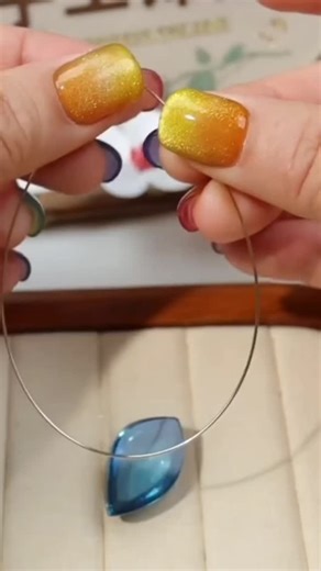 Wire Wrapping Tutorial on Instagram: "@xxpearl_jewelry beautifully highlights the serene elegance of aquamarine with this wire-wrapped pendant 💙 Clean wrapping, soft movement, and a timeless gemstone come together in a piece that feels both delicate and refined. . . . #handmadecrafts #handmadewithlove #handmadejewelry #diyjewelry #diyjewelrymaking"