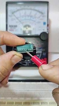 How to test an electrolytic capacitor on a circuit board using an analog multimeter. #shorts