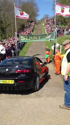 Supercharged 3.2 V6 Alfa Romeo 159 going up the test hill at Brooklands Race Track Run 1