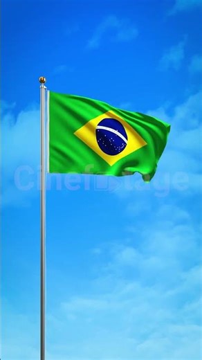 Brazilian Flag Waving on Flagpole in Blue Sky for National Pride stock footage | Cinefootage
