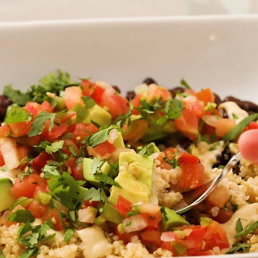 We'd happily eat this Black Bean-Quinoa Buddha Bowl every single day. RECIPE HERE: https://trib.al/e3SOLgR | EatingWell