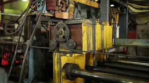 Industrial lathe mechanism in manufacturing process
