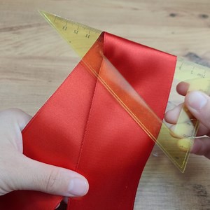 2.8K views · 95 reactions | Making a bow with wide ribbon. Simple bow making for Christmas. | Knitting Woman and Embroidery | Facebook