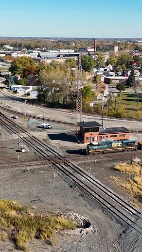 1.9K views · 2.1K reactions | A westbound CSX manifest pounds the diamond in Fostoria, OH. #railroad #railway #train #drone #rail #reels #fblifestyle | Craig Hensley Photography | Facebook