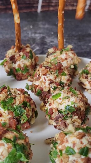 🏈 Your game day grub just #leveledup with these Smoked Cream Cheese Ball Loaded Bites Thanks to the smoked cream cheese, these loaded cheese ball bites are the best out there! Plus they are rolled in crispy bacon, toasted pecans, and green onions! 🥰Follow @thekitchenwhisperer for the best recipes! 👉🏻Recipe: https://www.thekitchenwhisperer.net/2024/11/26/the-best-smoked-cream-cheese-ball-loaded-bites/ Made in my @geprofile Indoor Smoker. #smokedcreamcheese #cheeseballs #thekitchenwhisperer #a