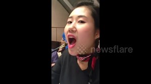 Waitress eats live scorpion on camera