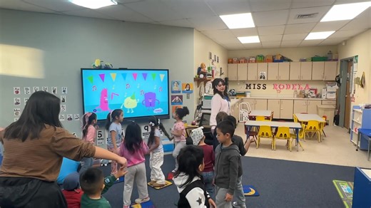 Teacher Miss Cynthia Rodela and Miss Noelia Coca provide the perfect combination for whole group learning, providing EAK letter instruction and then adding in a little music and movement with the Freeze song to promote movement, regulation, and whole body learning. | Bright Beginnings Early Childhood Center, Dodge City, KS
