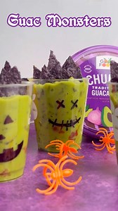 👻 Easy Halloween DIY 🎃 Draw spooky faces on the side of a clear cup, add Chunky Guacamole, and top with blue corn tortilla chips! Three simple steps to make the cutest little monsters! Find Good Foods Guac in stores near you: https://goodfoods.com/store-locator | Good Foods