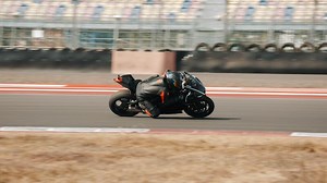 Motorcyclist rides on a race track. Motorcycle racer training.
