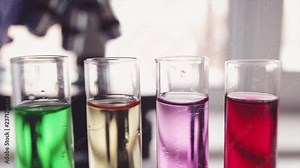 Laboratory tube and microscope. Laboratory tube and microscope is used by scientists and students for analysis and study in chemical laboratories, for research experiments in science-educational demo.