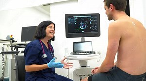 Cardiologist explaining the results of an echocardiogram to a patient
