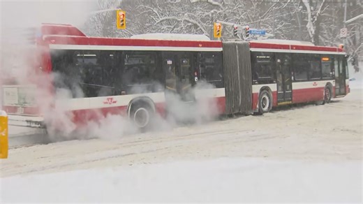 TTC bus struggles to make left-turn on icy uphill