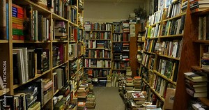 Walking through a bookstore full of old and new books library