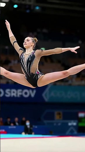 Gymnast’s Jump & Split in Mid-Air: Breathtaking Move!
