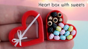 95K views · 1.1K reactions | Miniature box made of polymer clay Cernit and lid made of transparent UV resin. Miniature cutters can be purchased at my shop or on Instagram (@sweetminidollhouse): https://www.etsy.com/shop/SweetMiniDollHouse I use Fimo liquid gel to glue macarons and cakes. I glue the ribbon and bow with super glue. | Sweetminidollhouse | Facebook