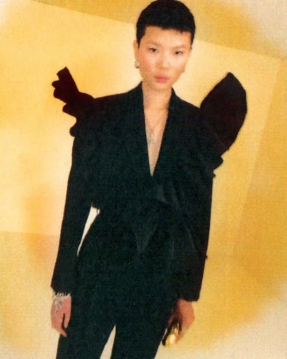 McQueen | A cropped tailored tuxedo jacket with exploded ruffles and tonal satin side stripe peg trousers. Discover the #McQueenPreSS22 collection... | Instagram