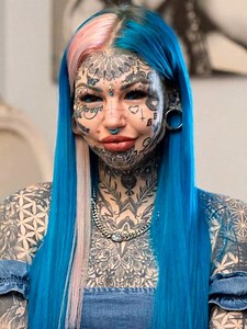 45K views · 217 reactions | Piercing, tattoos and ear tunnels若This model with an unusual appearance has 600 tattoos on her body. It is even scary to look at her body 廊 A freaky personality - that’s what they call her on the NetLook at her photos in the comment box below⬇️⬇️⬇️ | About Everything | Facebook