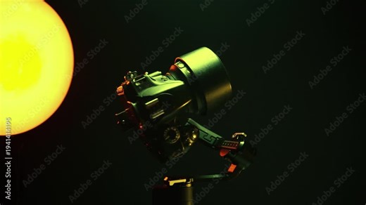 new electronic gyroscopic stabilizer for small SLR and mirrorless cameras and still cameras controlled via smartphone or joystick