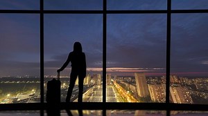 Woman Suitcase Stands Near Windows Night Stock Footage Video (100% Royalty-free) 1055992121 | Shutterstock
