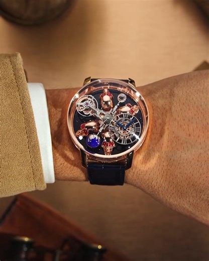 JACOB & CO. on Instagram: "The Astronomia Art Skulls is a masterpiece in motion, where haute horology meets artistic craftsmanship. Intricately sculpted skulls take center stage within the iconic Astronomia movement, creating a captivating display of mechanics and symbolism. A bold expression of Jacob & Co.’s limitless creativity. 50-mm rose gold case 5 hand-made rose gold skull sculptures with ruby eyes Double-axis flying tourbillon #Jacobandco #Inspiredbytheimpossible"
