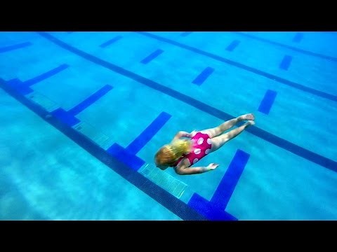 4 year old dives off Diving Board, Swimming Around the Pool, and Diving Down Deep