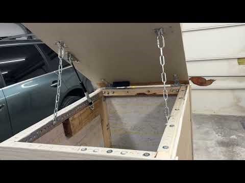 Package drop box - gas lift strut installed