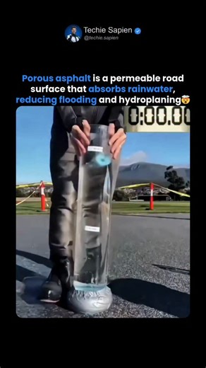 Techie Sapien - AI | Robotics | Next-gen Tech on Instagram: "Porous Asphalt Roads That Absorb Rainwater! 🤯 Porous Asphalt Roads That Absorb Rainwater to Prevent Flooding 🤯🌧️ Porous asphalt is a next-generation road technology designed to absorb rainwater directly through the pavement instead of letting it pool on the surface. Unlike traditional roads, this asphalt contains tiny interconnected gaps that allow water to drain vertically into underground stone layers. This reduces urban flooding,