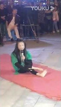 Pretty polio girl performing.