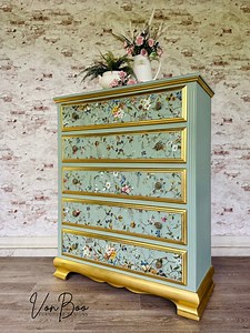 I was thrilled to play with this gorgeous transfer called “Lost Garden” from IOD - Iron Orchid Designs One of their new products in the 2025 Spring release. I have always had a soft spot for IOD florals and I love how this one allows some freedom to create your own unique design. This chest of drawers was perfect to play with 6 of the 8 sheets of transfers in this set. I was hoping to create a vintage wallpaper kinda look, highlighted with some gold foil. The background mineral paint colour is “