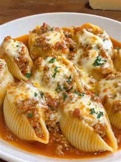 These beef-stuffed shells with a creamy ricotta filling are easy, hearty, and cheesy! They're a perfect weeknight dinner that tastes like a special treat.