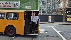 Moment Scots rockers Travis perform for fans from back of a Glasgow bus
