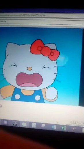 Kitty is crying because she broke the computer