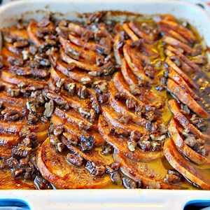 FULL RECIPE HERE >> https://goo.gl/L8Yeuc NATURALLY SWEETENED with honey and orange juice then studded with pecans flavored with cinnamon this delicious Candied Sweet Potato Casserole is the perfect side dish for Thanksgiving, Christmas or any holiday. | Moore or Less Cooking Blog