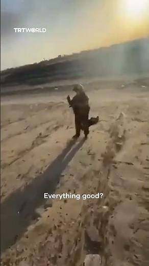 Kuwaiti civilians approach US F-15 pilot after he ejects