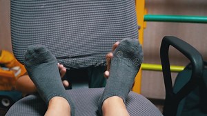 Children`s Hands Tickle Moving Female Legs in Grey Socks on Armchair in Bedroom Stock Footage - Video of happy, body: 200565962