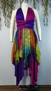 Here is the winner's Tattered Pixie Dress design from my most recent giveaway💖 She created a knee length, drawstring, infinity top dress with purple and magenta base using the new customizer tool. For her hand dyed tatters, she wanted ombre in these amazing shades of teal, gold moss, rust, magenta and purple. It was so fun to see all the amazing entries, and ai truly enjoyed creating this one! #colorfuldress #infinitydress #fairydress #colofulfashion #rainbowdress | Tattered Pixie