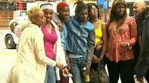 Gang Check It performs for Chinatown merchants