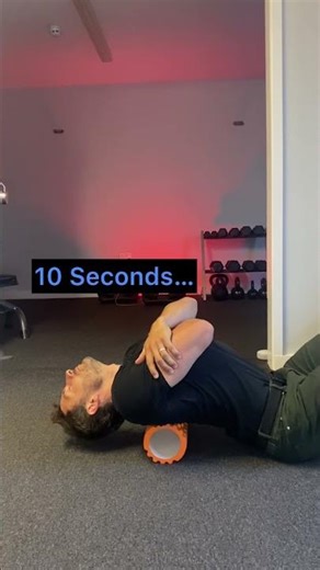 Ease back pain with this foam roller stretch. #backpain #foamroller #foamrollerexercises