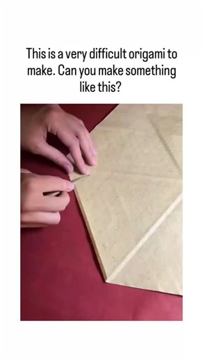 Asthetic1447 on Instagram: "The post features a 27-second sped-up video of folding a single tan paper sheet into a complex "Star Puff" origami tessellation by Ralf Konrad, creating a flat yet textured hexagonal star pattern through precise valley and mountain folds. This design exemplifies origami's geometric foundations, where repeating units tile the plane via Miura-ori principles, supported by research in the Journal of Computational Geometry showing applications in deployable aerospace struc