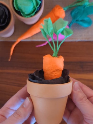 DIY Crepe Paper Veggie Surprises 🥕 I found this idea from @Martha Stewart and had to make these treat surprises for Easter! I wrapped small toys, stamps, and jewelry with crepe paper in the shape of vegetables and planted them in little terracotta pots. It was so fun to watch the girls unwrap them! We ended up rolling the paper back up into vegetables to use as a pretend veggie garden #kidcraft #easycraft #papercraft