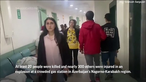 Russian 'peacekeepers' evacuate victims after deadly gas explosion