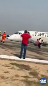 29K views · 662 reactions | Myanmar plane made emergency landing without front wheel on May 12. All 82 passengers and 7 crew members are safe. #Myanmar | China Daily | Facebook