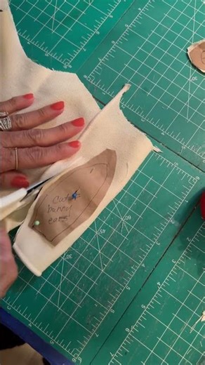 Cutting out a pattern for a stuffed bunny