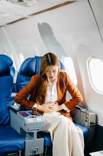 Feel gross and bloated when flying? Here's why jet belly happens and expert advice to avoid it.
