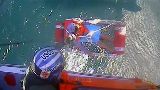 Coast Guard saves capsized boaters clinging to cooler