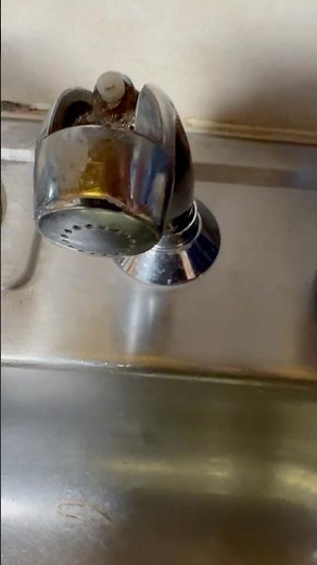 Replacing broken kitchen faucet sprayer.