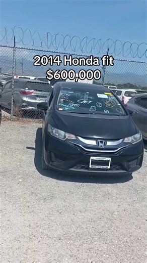2014 Honda fit available color black 16,000 KM Button start keyless entry touchscreen radio Dual AC