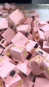 5.3K reactions · 502 shares | What’s nougat? It's a chewy, airy confection made by whipping honey and sugar into egg whites… For our raspberry flavor, we also fold in roasted almonds, dried cranberries, candied fruits for a fruity, nutty bite that's perfectly balanced. They are available in 3oz and 6oz bags, perfect for gifting, sharing or solo snacking  #nougat #raspberry #jeanmarieauboinechocolatier #lasvegas | Jean-Marie Auboine Chocolatier | Facebook