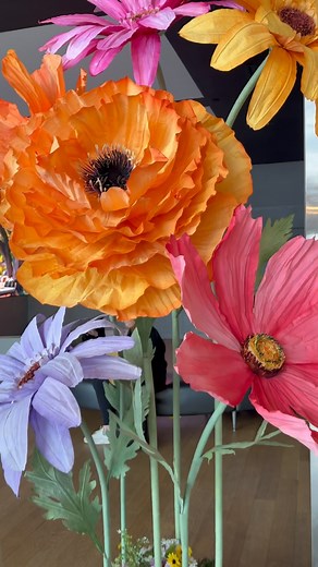 21K views · 15K reactions | Bright and catchy summer paper flower installation for @torontopearson #tsemkodecor #paperflowers #giantflowers #partflowersdecor #windowdisplay #storefront #setdecor #silkflowers #artist #design #diy | Tsemko Decor | Facebook