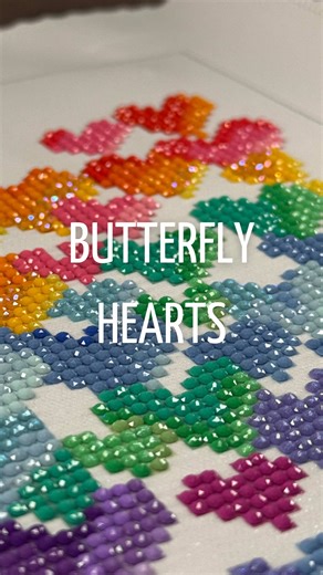 I AM OBSESSED. 🦋 🖼️ Butterfly Hearts by Colie’s Creations / Diamond Art Club 🏁 Started: 1/1/26 📏 Size: 13” x 13” (32.8cm x 32.8cm) 💎 4,557 ⚫️ Round Drills 🎨 30 Colors 2 ABs 4 Fairy Dust Use the discount code “ELAINE10” for $10 off your first Diamond Art Club order. 💕 #diamondpainting #diamondpaintingaddict #diamondart #asmrsounds #asmr